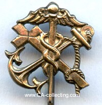 MERCHANT PROFESSIONAL BADGE ABOUT 1900.